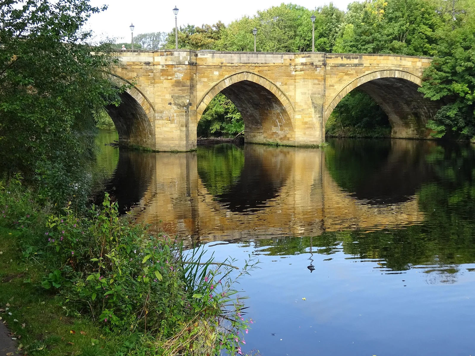 Historic stone Yarm Bridge crossing the River Tees
