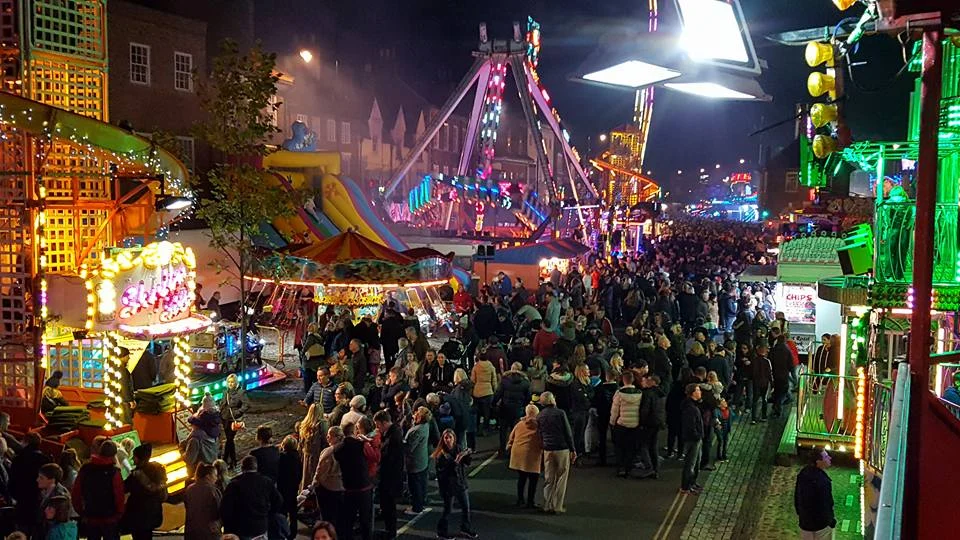Illuminated fairground rides along Yarm High Street during Yarm Fair in 2017