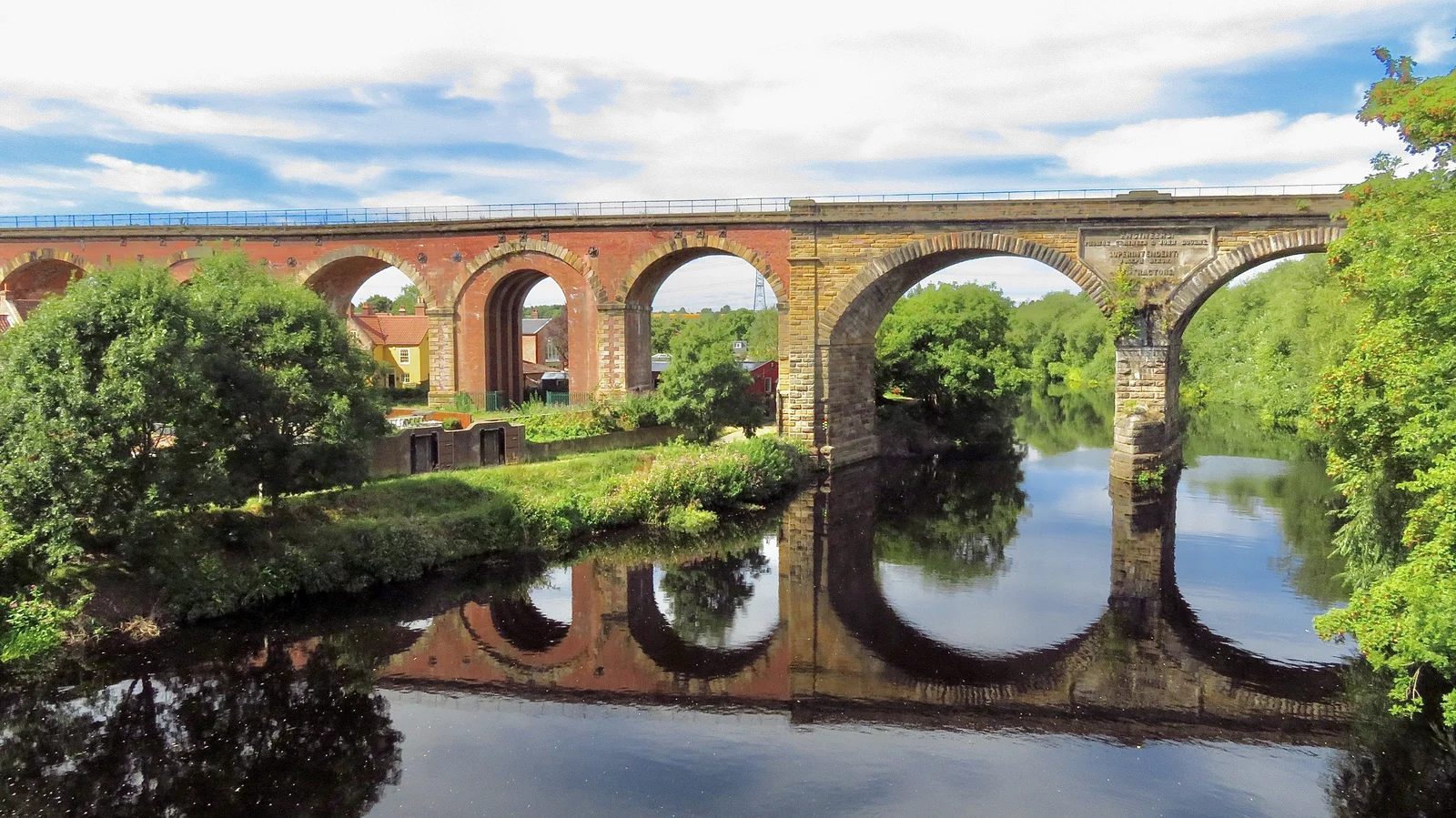 Yarm Railway Viaduct's arches reflected in the River Tees